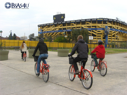 Bike tour arriving at La Bombonera stadium.