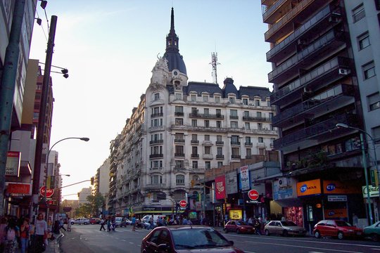 A number of skyscrapers can be seen along the street
