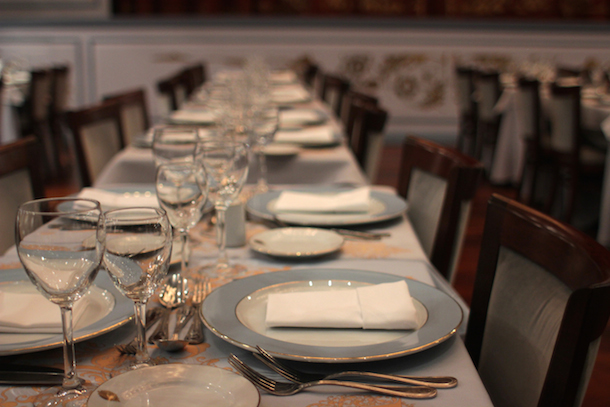 The tables inside the theatre set for dinner | Café de los Angelitos