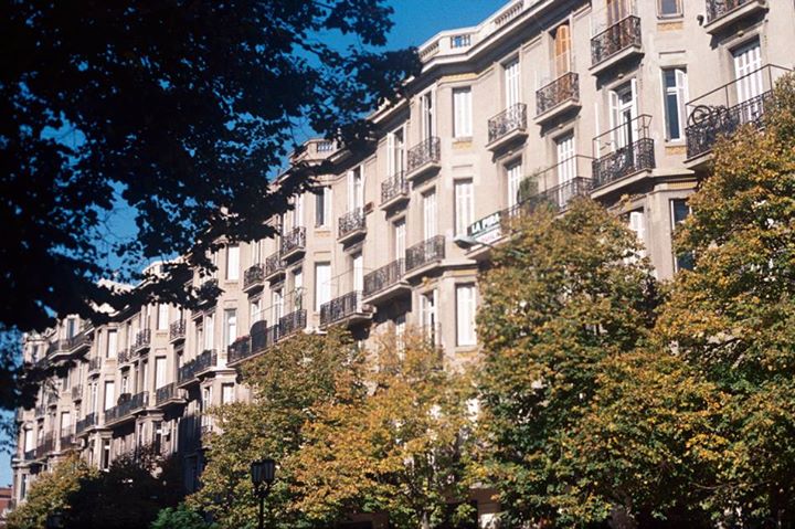 Looking up at the architecture of colonial mansions on Avenida Caseros